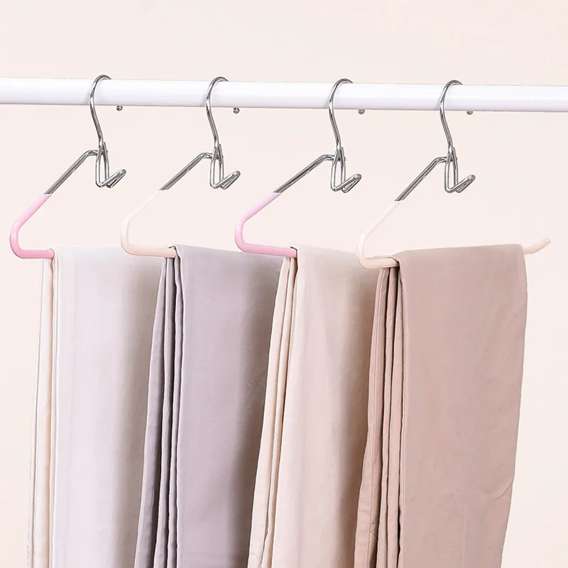 Clips stack multiple layers of space-saving household pants hangers